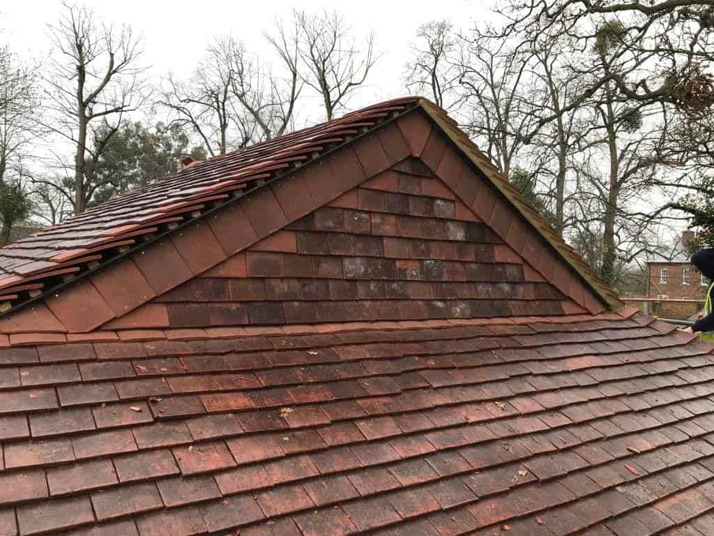 This is a photo of roof gable end tiled in Sittingbourne Kent. All works carried out by Sittingbourne Roofing Services